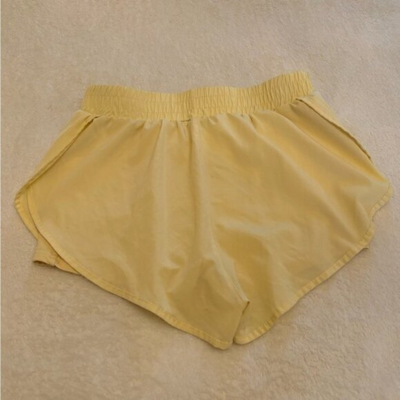 YELLOW ATHLETIC SHORTS WITH YELLOW SPANDEX SZ SMALL - Picture 2 of 5